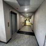 Interior hallway with clean drywall and painted surfaces