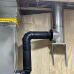 Metal exhaust duct with flexible piping and damper installed in mechanical space