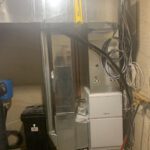 Large overhead in-floor radiant heating system with flexible tubing and controls