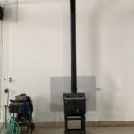 Mechanical room exhaust vent pipe installation with ceiling penetration