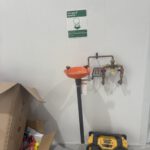 Plumbing manifold with ball valves and hot water system