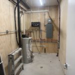Electrical panel and distribution box in utility closet
