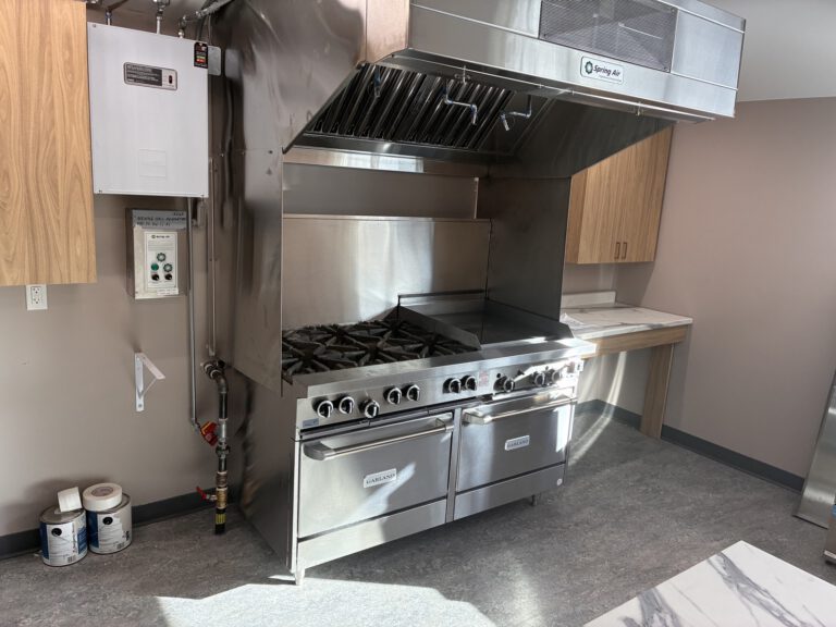 Commercial kitchen gas range and hood install