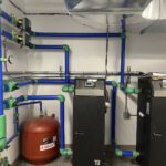 Mechanical room with AMTROL expansion tank and manifold piping systems