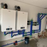 Twin high-efficiency boilers with color-coded manifold