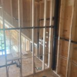 Wide view of joist system showing multiple radiant heating loops laid out