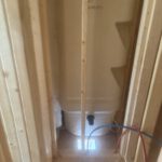 Joists and beams with radiant heating lines routed overhead