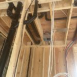 Framing studs and bays with integrated radiant heating installation