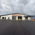 Finished paramedic station side view showing garage doors and entry areas