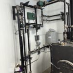 DS Stoves wood boiler with black steel piping