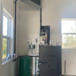 Wood boiler unit with cast door and green expansion tank
