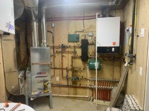 AIRMAX water heater system with expansion tank, manifold and brass fittings installation