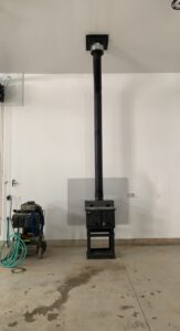 Mechanical room exhaust vent pipe installation with ceiling penetration