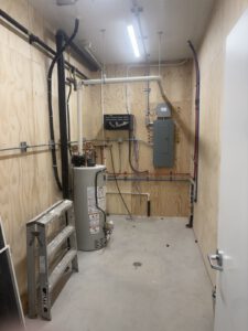 Electrical panel and distribution box in utility closet