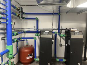 Mechanical room with AMTROL expansion tank and manifold piping systems