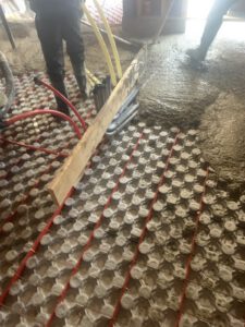 Concrete pour over radiant floor tubing