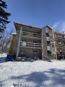 Vertical building exterior angle showing construction progress