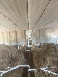 Radiant floor heating system with supply pipes and connections