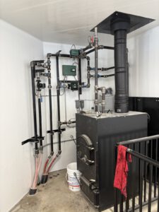 Radiant heating manifold assembly with multiple zone controls and colored PEX tubing