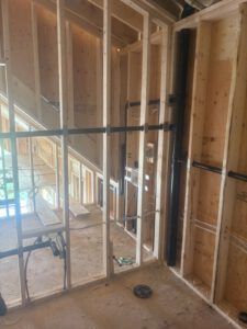 Wide view of joist system showing multiple radiant heating loops laid out