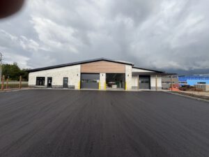 Finished paramedic station side view showing garage doors and entry areas